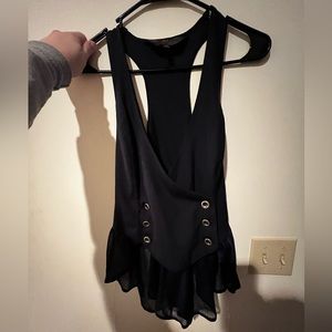 Peplum “Alice in Wonderland” collection vest. Navy blue with bronze hardware.